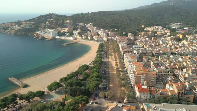 Sant Feliu de Gu&iacute;xols on the Costa Brava of Gerona aerial images coastal promenade old buildings