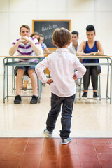 Little teacher in his classroom