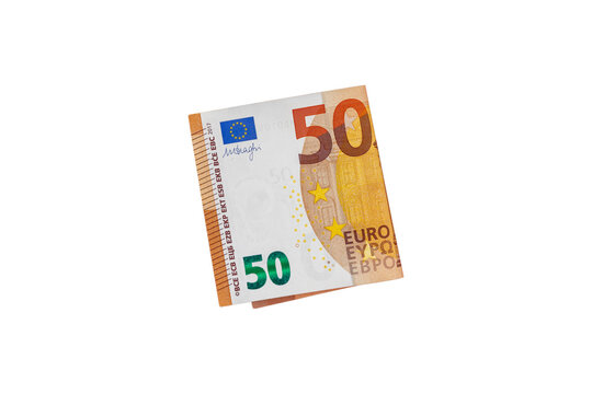 Fifty euros folded in half isolated on a white background. Paper money. Free space for copying.