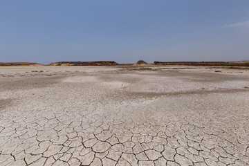 Desert with footprints on the site of a dried-up lake