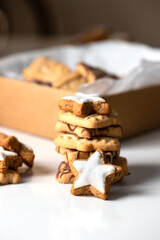 Different shape Christmas cookies box on white background. Festive treat