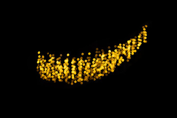 Defocused yellow lights on black isolated background. Design element. Christmas, New Year, holiday. Copy space