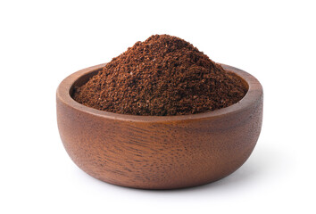 Ground roasted coffee beans in wooden bowl isolate on white background. Clipping path.