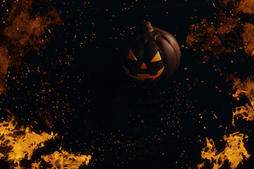  chocolate halloween pumpkin jack-o-lantern on dark background