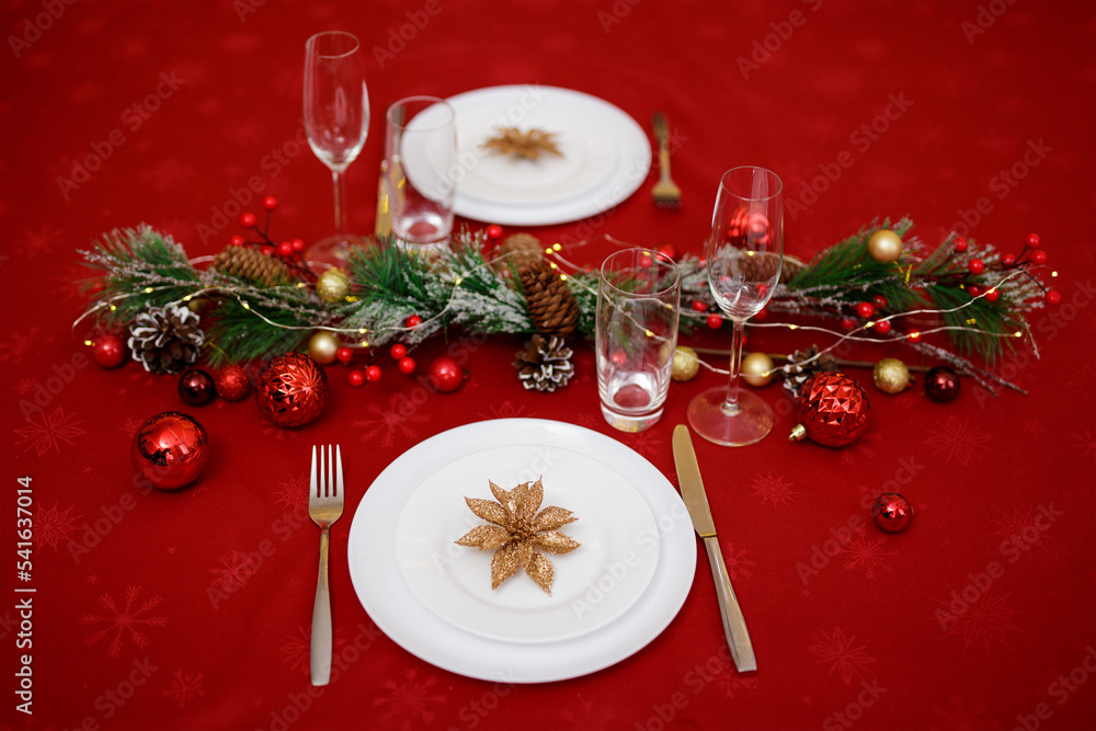 Wall mural Decorated table for two persons on christmas dinner