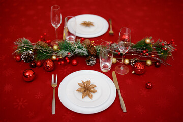 Decorated table for two persons on christmas dinner