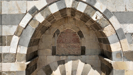 Zazadin Han Caravanserai in Konya, Seljuk period structure. Caravanserai is located on the Silk Road. The construction inscription of the caravanserai.