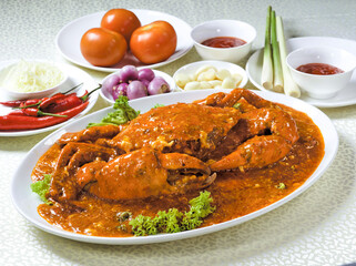 Closed up of delicious Chilli Crab with sauce and fresh ingredients