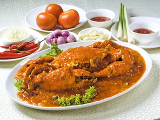 Tuinposter Closed up of delicious Chilli Crab with sauce and fresh ingredients © Robert Stedman