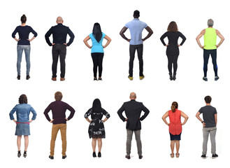 Obraz premium back view of large group of peple with arms akimbo on white background