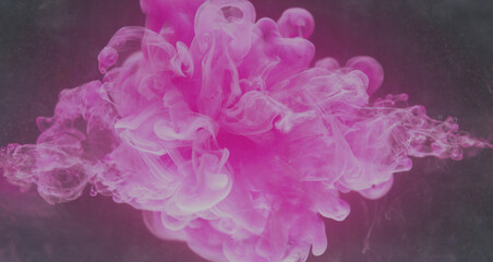 Color explosion. Ink water splash. Fantasy vapor. Neon pink fluid drop floating on dark glitter...
