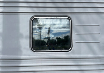 The concept of travel and vacation. Selective focus. Train window, departure, trip