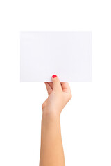 Fototapeta premium Girl's hand holding a small sheet of paper. Blank paper for text presentation.