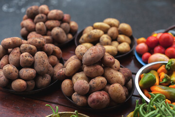 Potato. A vegetable counter at a street market. Trade in seasonal goods.