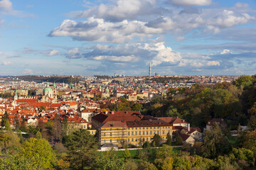 Fototapeta premium Autumn Prague City with with its Buildings, Towers, Cathedrals and Bridges in the sunny Day, Czech Republic