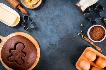 Christmas Baking background. Ingredients for cooking christmas baking on light background. Top view with copy space. Gingerbread cookies. Baking Ginger cookies. Raw dought for cookies