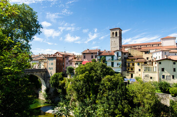 Panorama di Cividale del Friuli in una giornata di sole primaverile con piccole nuvole nel cielo
