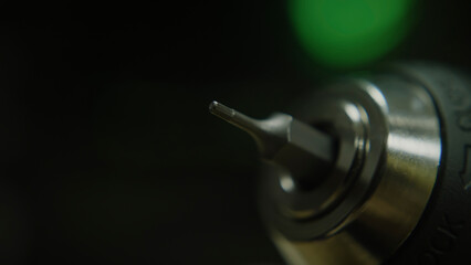 Rotating drill bit micro head, macro extreme close-up, technology and toolkit concept
