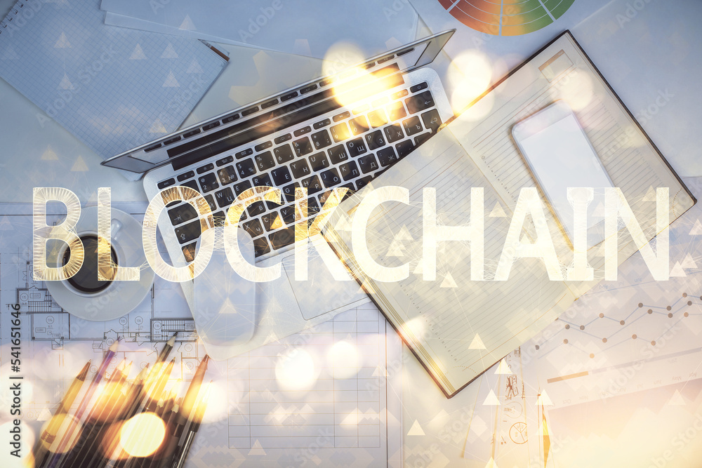 Aufkleber Blockchain theme hologram drawings over computer on the desktop background. Top view. Multi exposure. Concept of cryptoeconomy.