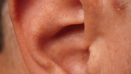 Close up photo of a man's ear macro shot