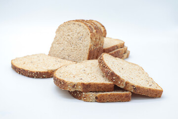 sliced ​​wholemeal bread, on white background. Concept of healthy food, balanced breakfasts, fiber foods.
