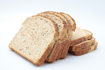 sliced ​​wholemeal bread, on white background. Concept of healthy food, balanced breakfasts, fiber foods.