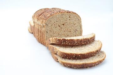 sliced ​​wholemeal bread, on white background. Concept of healthy food, balanced breakfasts, fiber foods.