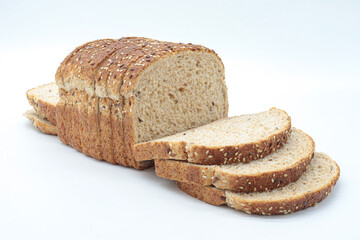 sliced ​​wholemeal bread, on white background. Concept of healthy food, balanced breakfasts, fiber foods.