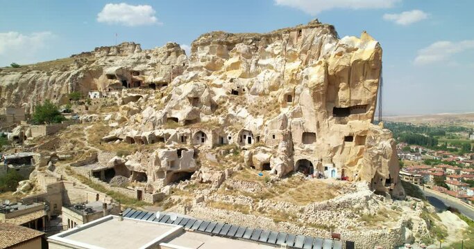 Urgup Fortress in Cappadocia, Turkey. A rock with caves. Aerial view. Stone Rock
