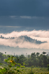 view of the town and mountain in the early morning mist is beautiful in the highlands of Gia Lai, Kontum, Vietnam. Nature landscape, mountain and foggy far away