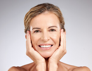 Senior woman, beauty and touch face, skincare and smile for aesthetic results, facial glow or...