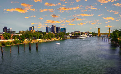 Sunset above Sacramento skyline, Sacramento River and Tower Bridge in California