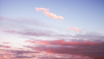 sunset sky background with pink and purple clouds, blue background