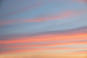 sunset scenery with stripes in pastel colors, pink orange and blue