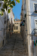 High steep step stairs on Lisbon street in Mouraria district