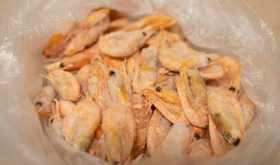 frozen small shrimp in a bag. Seafood benefits, protein, vitamin d3. Problems in the supply of frozen products
