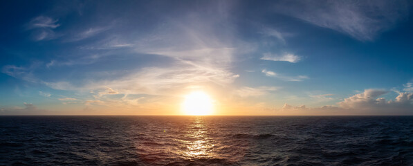 Dramatic Colorful Sunset Sky over North Atlantic Ocean. Cloudscape Nature Background. Panorama