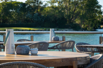 Table and chairs near a lake in Ria Formosa region © Mauro Rodrigues
