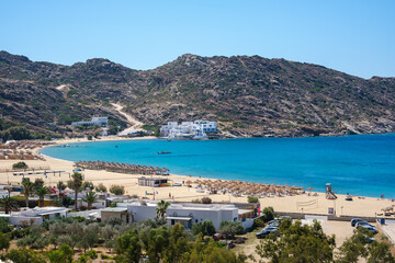Naklejka na ściany i meble Breathtaking panoramic view of the famous Mylopotas beach in Ios Greece