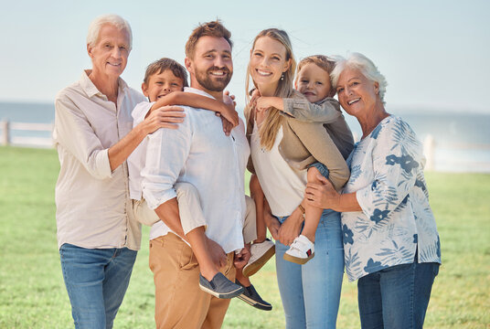 Love, Family Or Portrait In Park With Grandparents And Children For Summer, Outdoor Holiday Or Wellness. Happy Big Family, Senior Man And Woman With Mom, Dad And Kids In Nature In Summer On Vacation