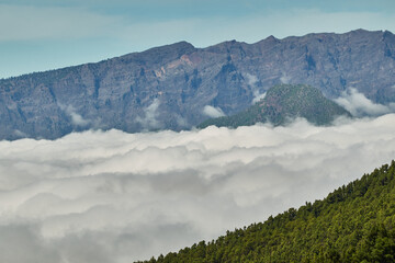 Seas of clouds, lava flows, the Teide of Tenerife in the background and many more spectacular landscapes on the route of the volcanoes (Cumbre Vieja) on the island of La Palma. Canary Islands. Spain