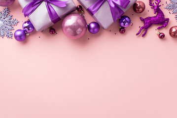 New Year concept. Top view photo of big lilac present boxes with ribbon bows pink violet baubles...