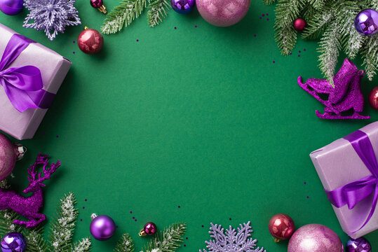 Christmas concept. Top view photo of lilac gift boxes pink violet baubles deer flower snowflake ice skates ornaments fir branches and sequins on isolated green background with copyspace in the middle