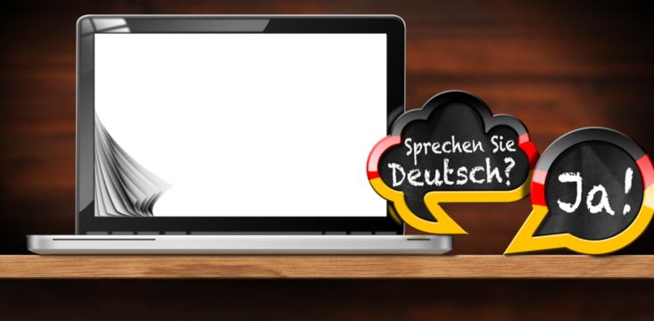 German language lesson. 3D illustration of two speech bubbles with German flag and question, Sprechen Sie Deutsch? and Ja! (Do you speak German? and Yes!). Modern laptop computer with blank screen.