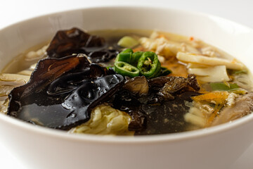 White Jjamppong Soup on a white background
