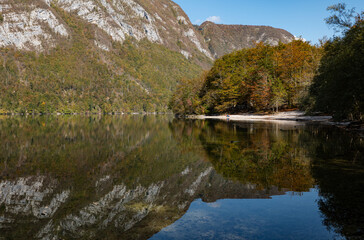 Lake Bohinj and Julian Alps in autumn, Slovenia, reflections in the water