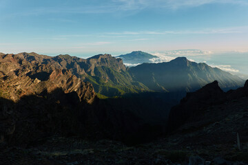 Fototapeta na wymiar Panoramic views from the Roque de los Muchachos of the Caldera de Taburiente National Park, the Cumbre Vieja Natural Park, Tenerife, La Gomera and El Hierro on the island of La Palma. Canary Islands. 