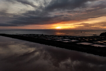 Obraz premium Sunset over the salt flats of Fuencaliente on the island of La Palma. Canary Islands. Spain