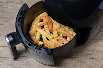Air fried crinkle cut chips.
