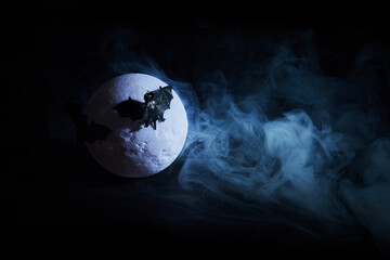 Halloween background. Spooky scary dark night full moon and bats.